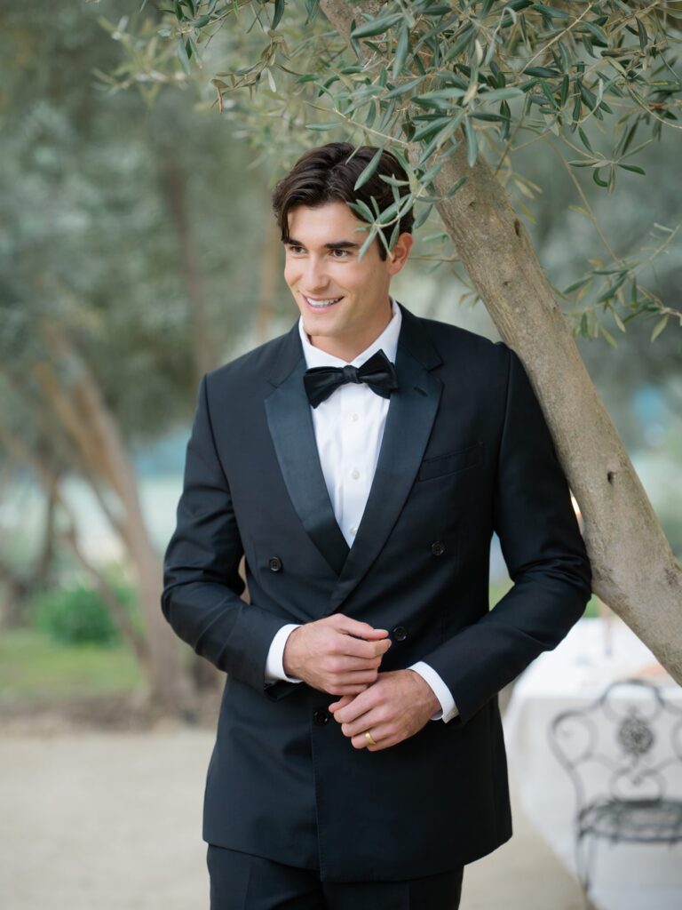 Groom in tuxedo at Olive Grove Garden in Rancho Valencia