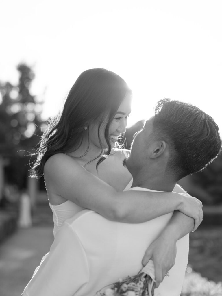 Couple embracing each other during Balboa Park engagement photoshoot